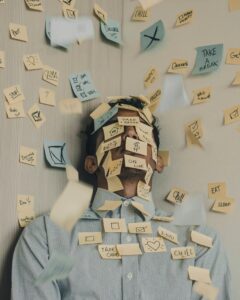 Man with post-it notes on his face